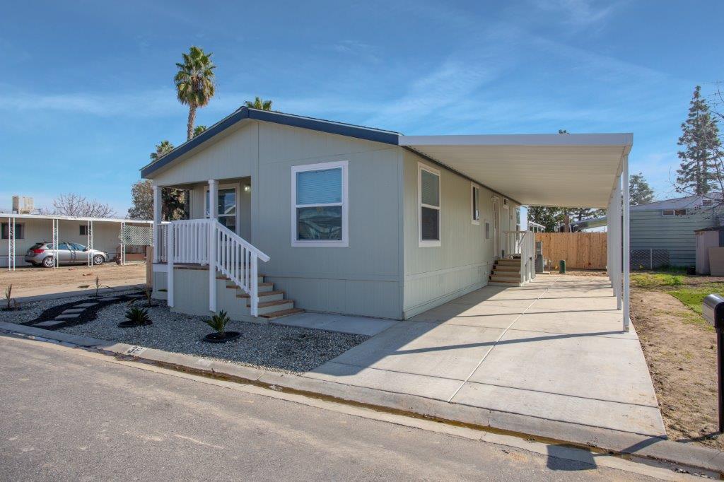single-wide mobile home with car port - Smoke tree MHP